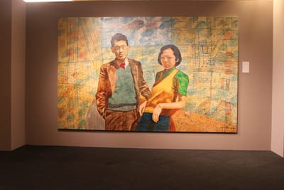 A large landscape painting of Lee Kuan Yew and Kwa Geok Choo.