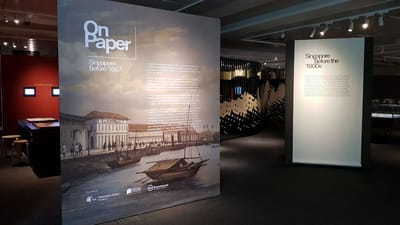 A photo showing the introduction wall of the On Paper exhibition.