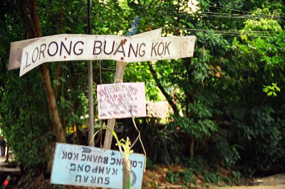 A street sign that reads, 'Lorong Buang Kok 19'.