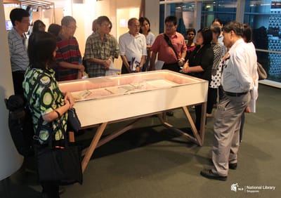 A photo of a tour in progress at the exhibition.